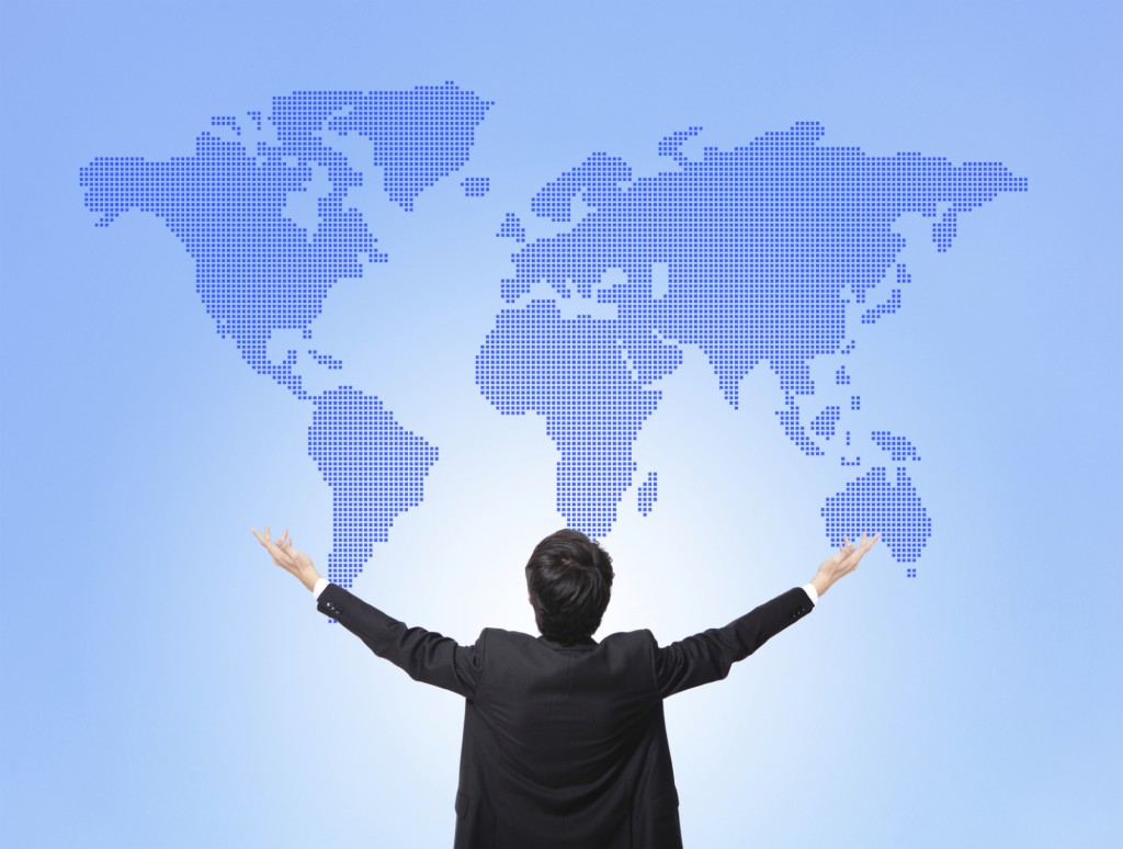Business man hug global map