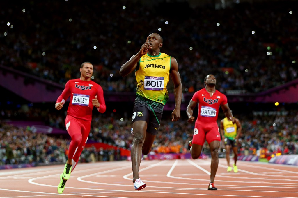 LONDON, ENGLAND - AUGUST 05:  Usain Bolt of Jamaica celebrates winning gold in the Mens 100m Final on Day 9 of the London 2012 Olympic Games at the Olympic Stadium on August 5, 2012 in London, England.  (Photo by Michael Steele/Getty Images)
