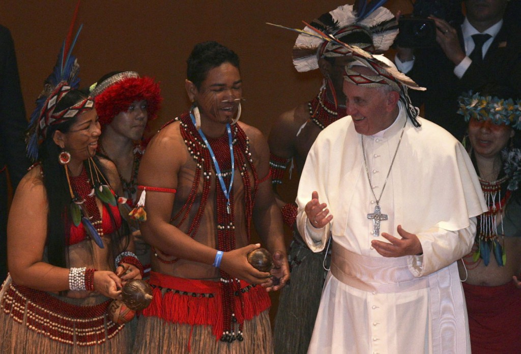 Pope Francis meets with native Brazilians during an encounter with representatives of the civil society in the Municipal Theater in Rio de Janeiro